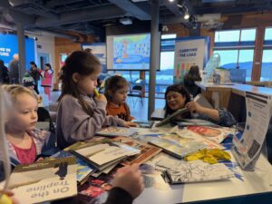 Unplug & Play children at book table